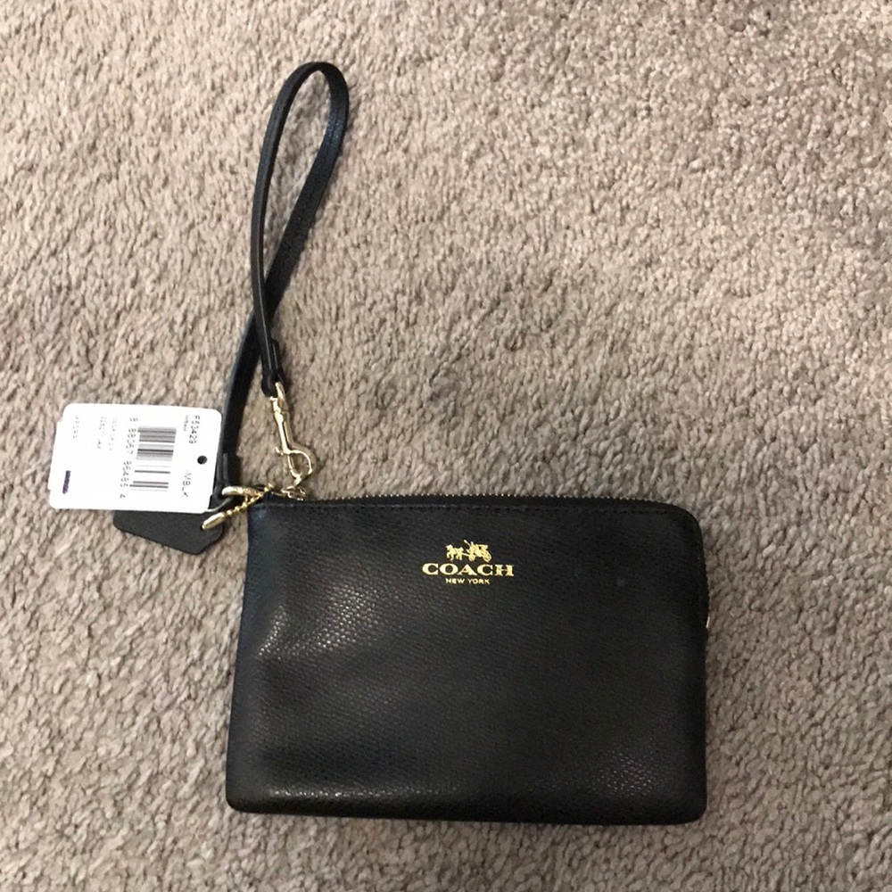 Black leather Coach wristlet